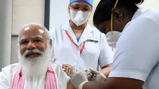 PM Narendra Modi joins community managers who got COVID vaccine picture to enhance people’s assurance